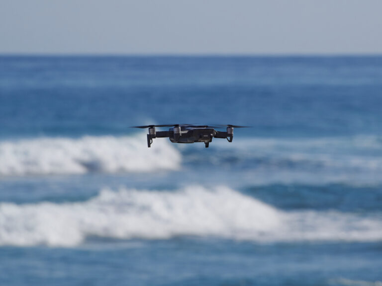 Quadrocopter,On,A,Background,Of,Blue,Sea