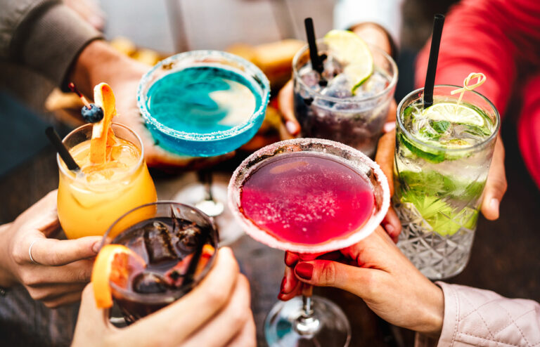 People,Hands,Toasting,Multicolored,Fancy,Drinks,-,Young,Friends,Having