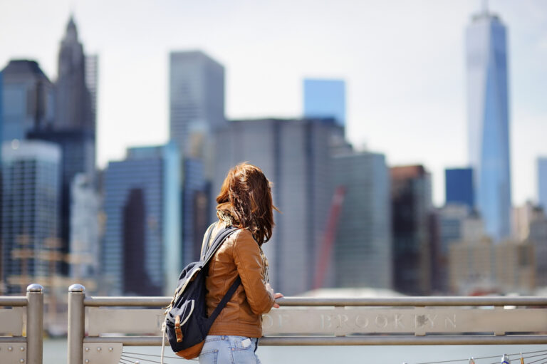 Young,Female,Tourist,Enjoy,Panoramic,View,With,Manhattan,Skyscrapers,In