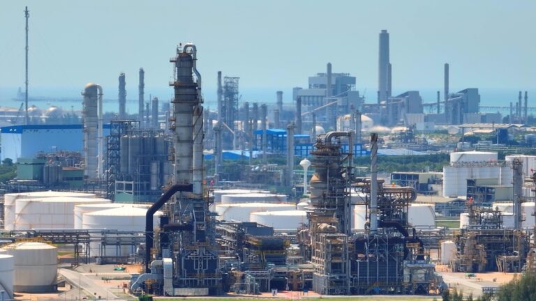 An,Oil,Refinery,,A,Web,Of,Pipes,And,Structures,,Surrounded