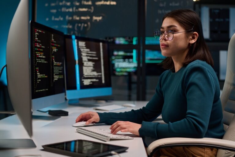 Side,View,Portrait,Of,Young,Woman,Wearing,Glasses,As,Cybersecurity