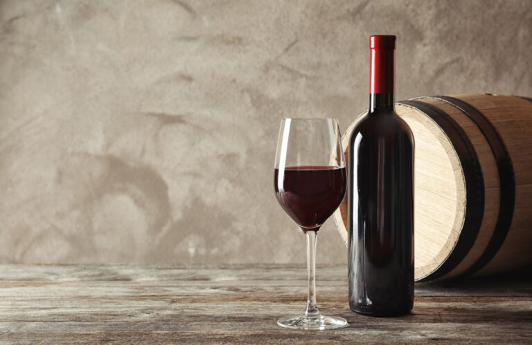 Glass,,Bottle,And,Barrel,With,Delicious,Red,Wine,On,Wooden