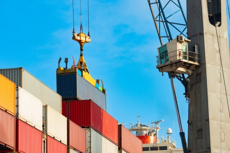 Cargo,Ship,Being,Loaded,With,Containers,At,Port,In,Chile