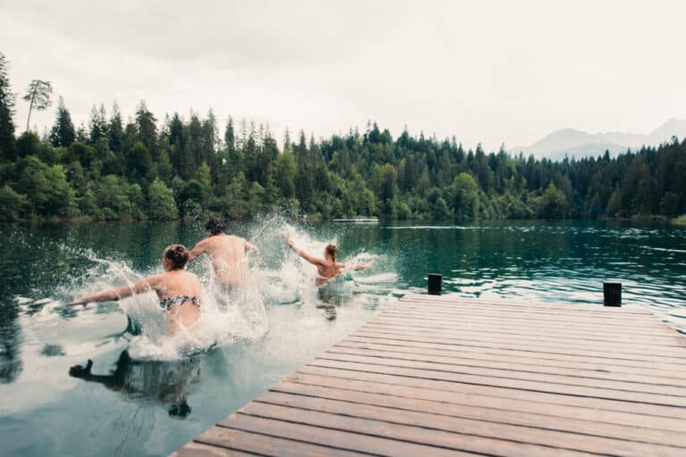 Group,Of,Friends,Having,Fun,At,The,Lake,In,The