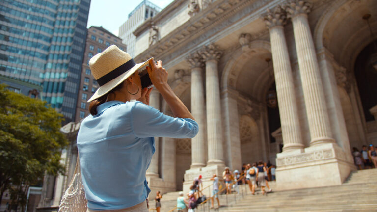 Young,Tourist,Taking,A,Photo,In,New,York,City
