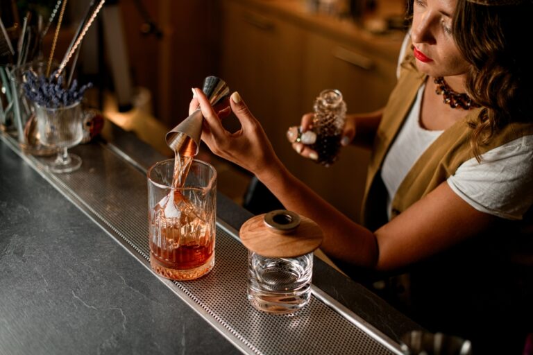 Top,View,Of,Mixing,Glass,In,Which,Bartender,Pours,Brown