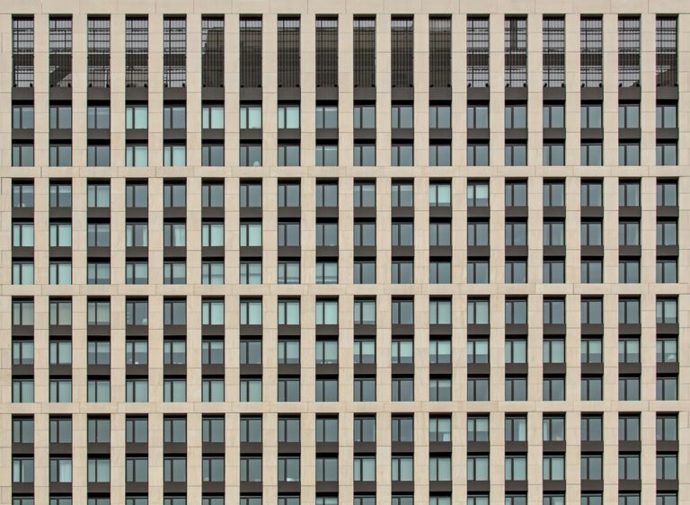 Building,Window,Detail,(grid,Of,Windows,In,Modern,Residential,Building,