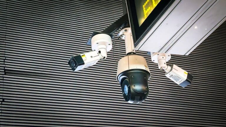 Low,Angle,View,Of,Modern,Security,Cameras,And,Cctv,Surveillance