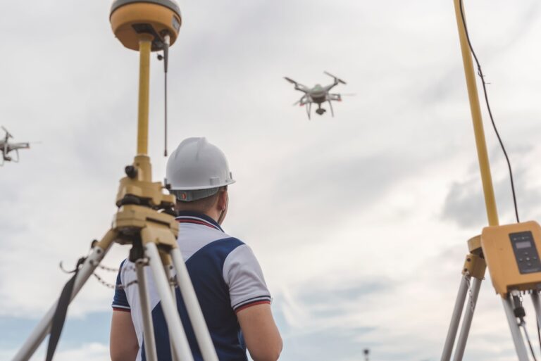 A,Surveyor,Operating,A,Drone,To,Conduct,Topographic,Rtk,Or