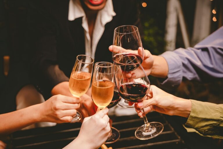 Happy,Young,Friends,Celebrate,Together,At,A,Stylish,Restaurant,,Enjoying